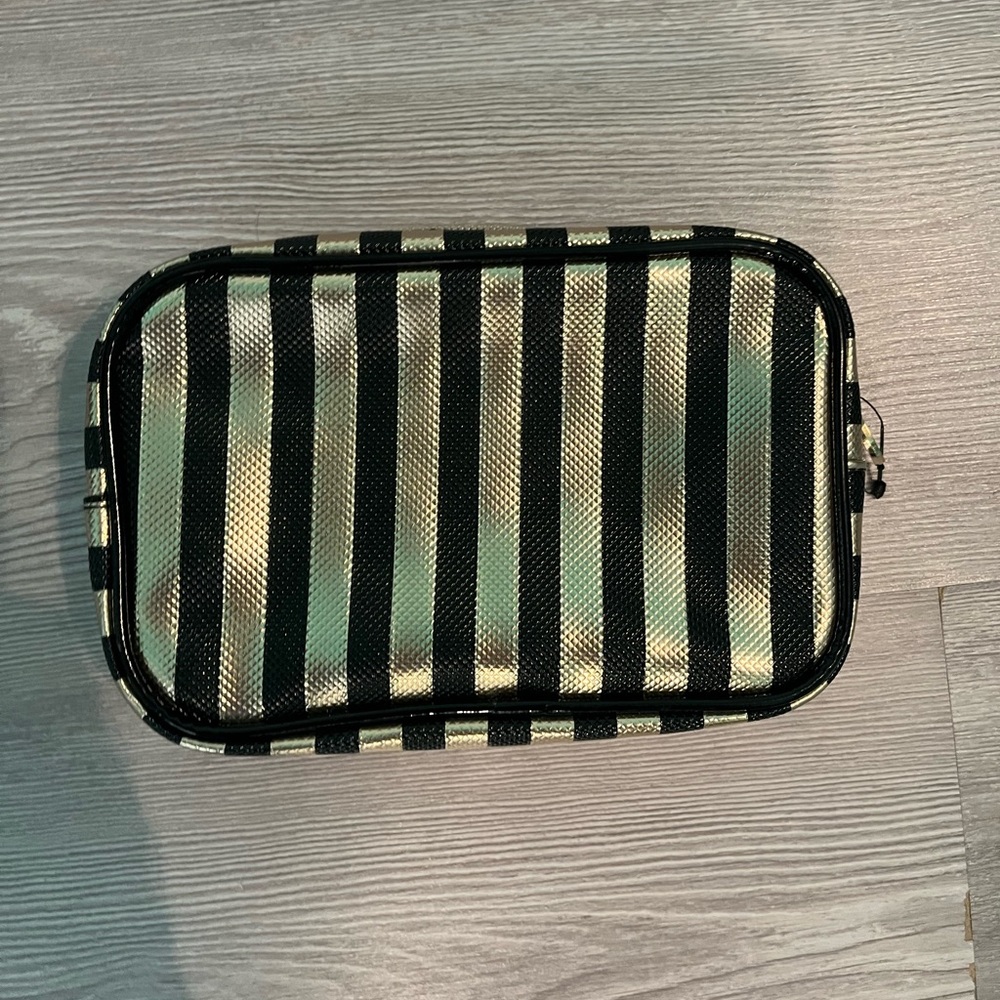 NWOT Simon Chang Black and Gold Striped cosmetic bag